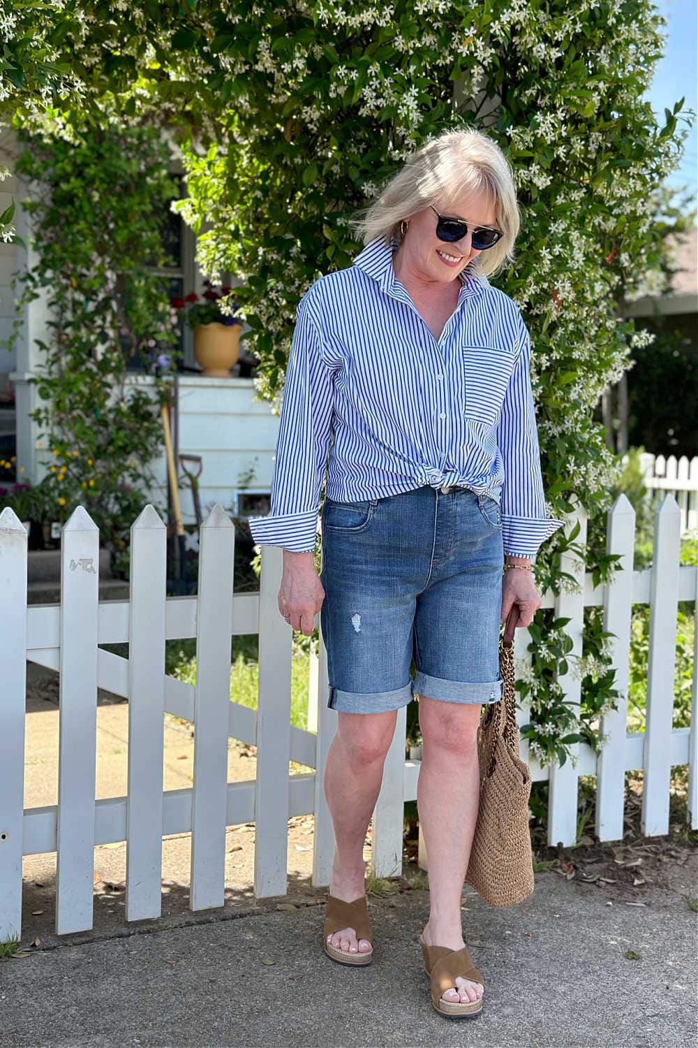 woman wearing easy care no iron shirt shorts and wedge sandals