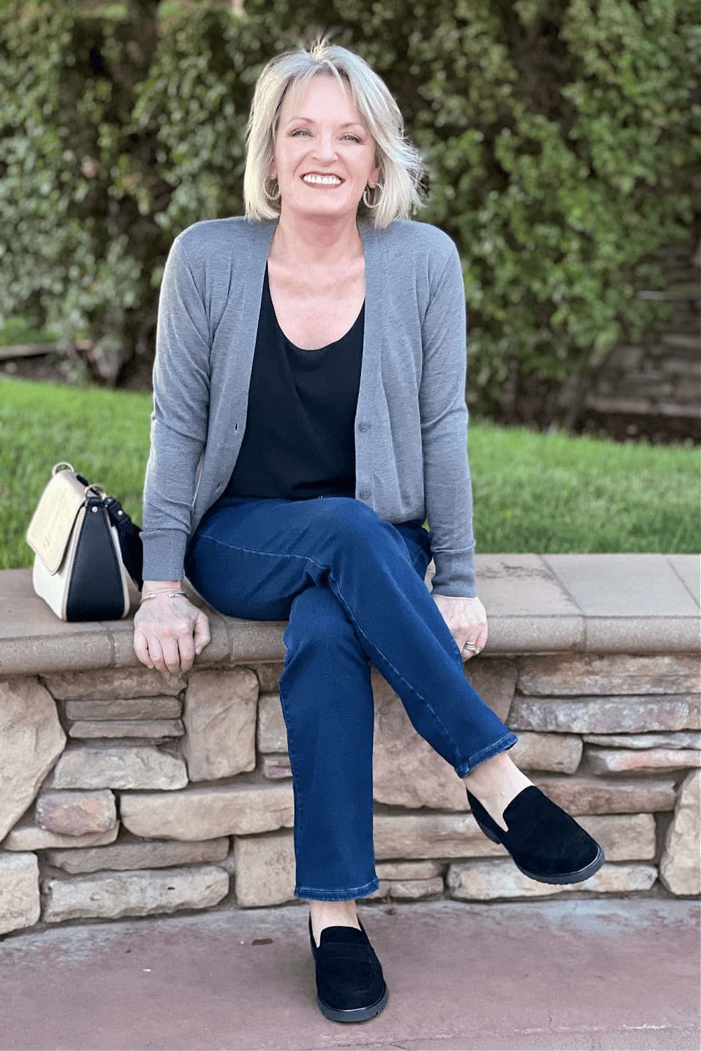 woman wearing classic neutrals for an exensive, casual look