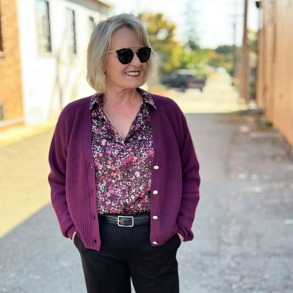 woman wearing halogen cardigan and floral blouse