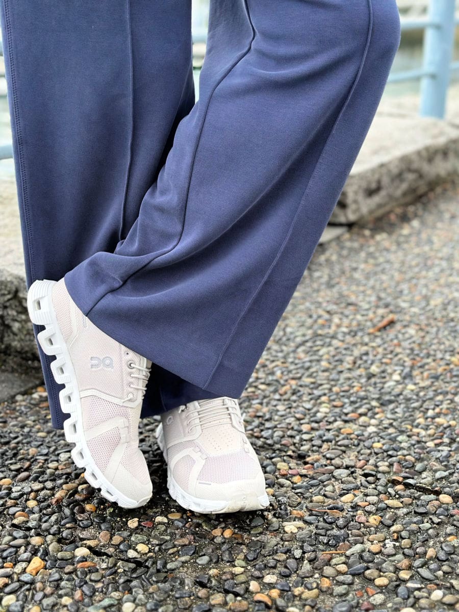 on cloud sneakers with casual athleisure outfit