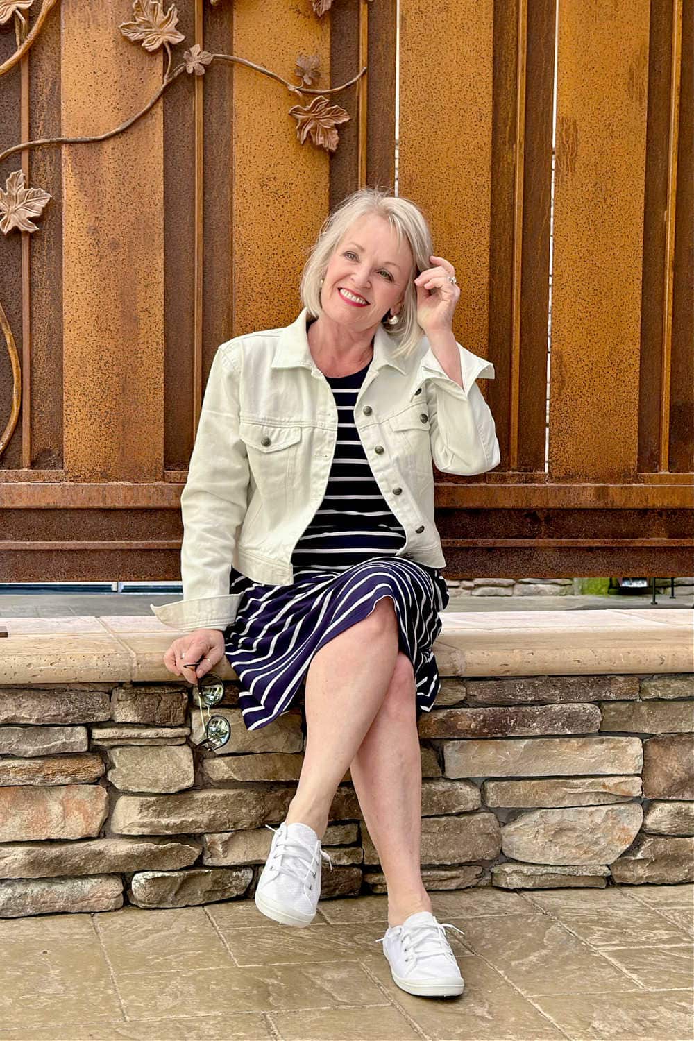 denim jacket over striped dress and sneakers from walmart