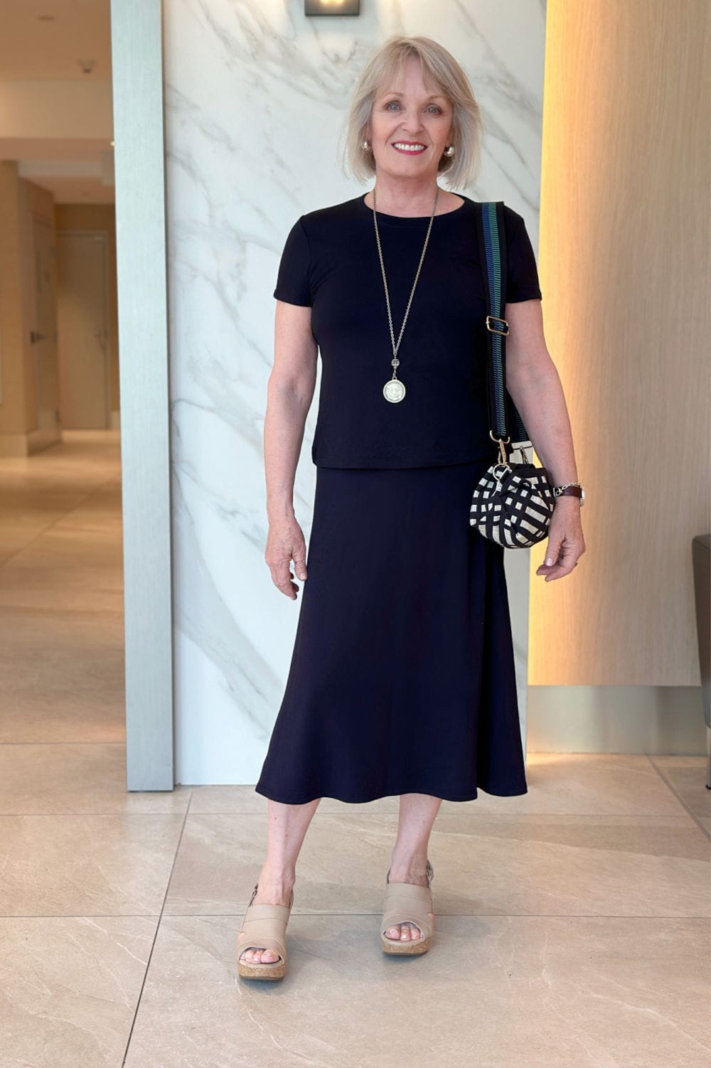 versatile neutral navy tee and skirt