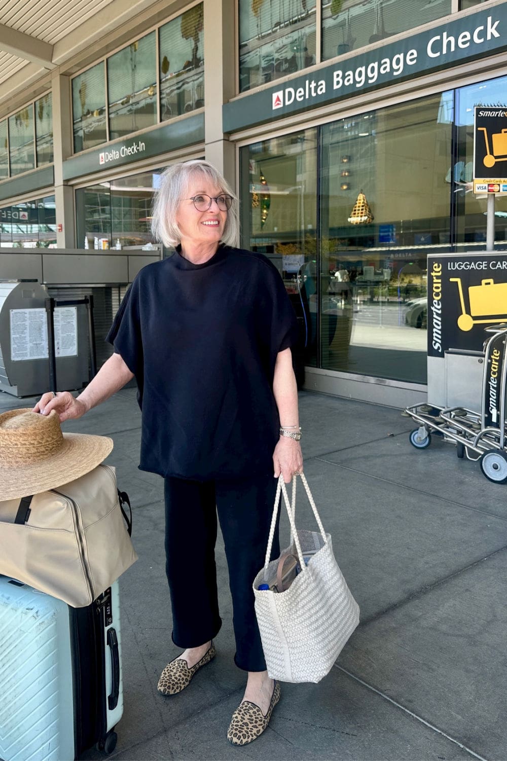 woman wearing malibu travel set with coastal chic vibe from frank & eileen