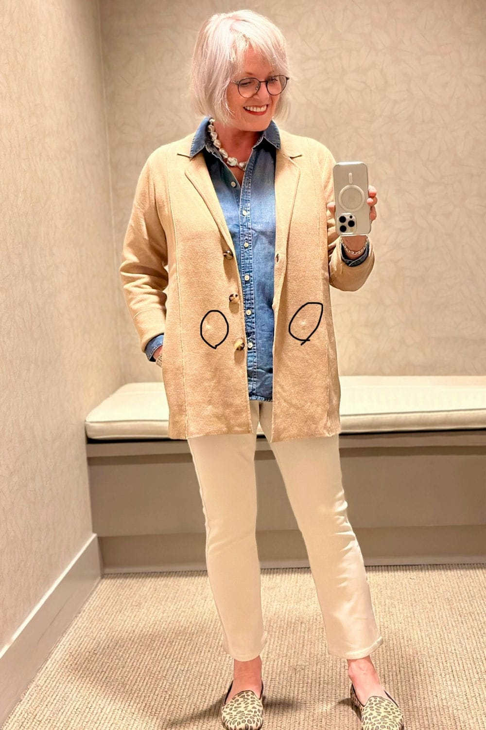 woman wearing beige double knit jacket at J Jill with denim skirt
