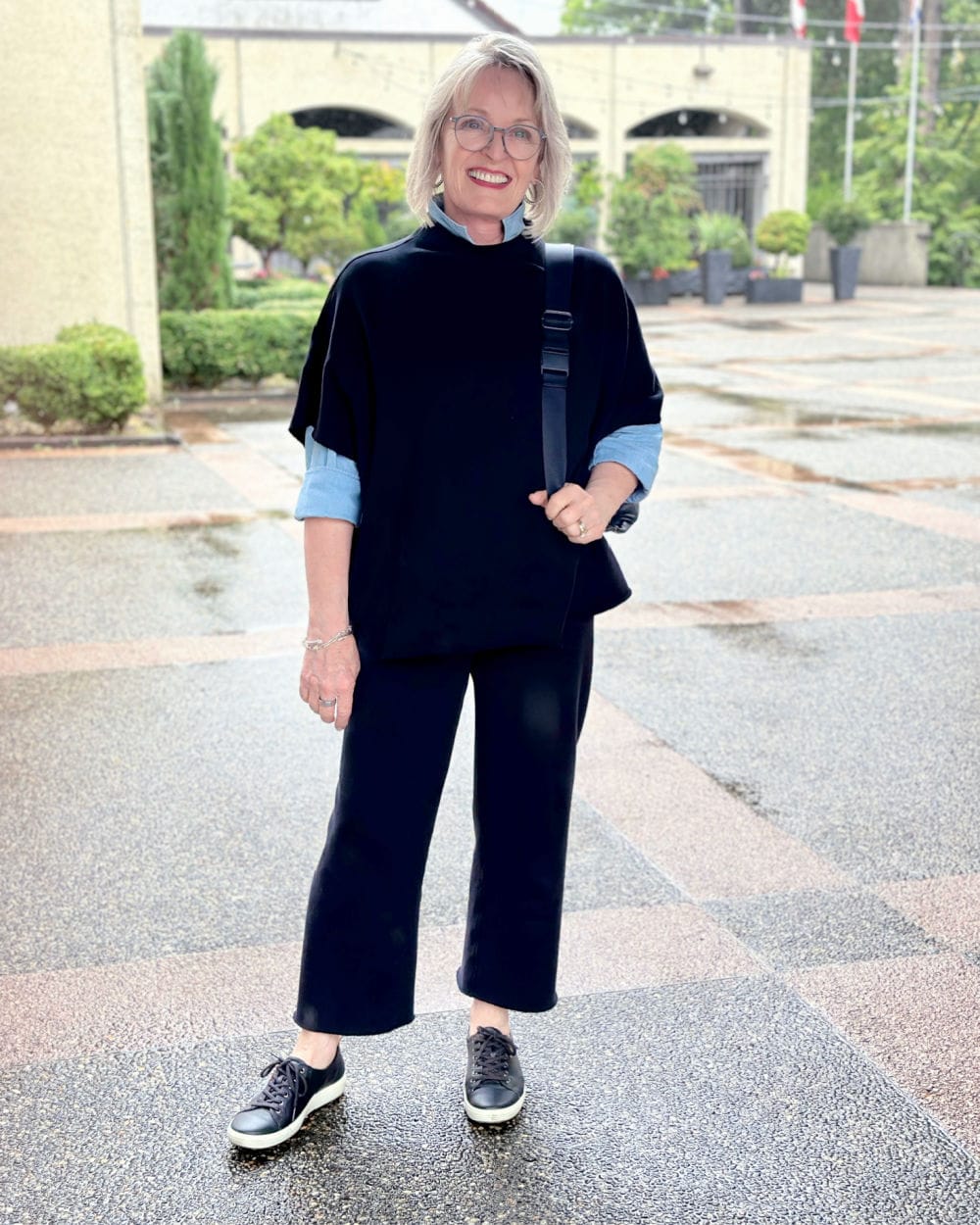 older woman wearing Ecco Soft 7 Sneaker minimalist leather sneakers for women with foot pain