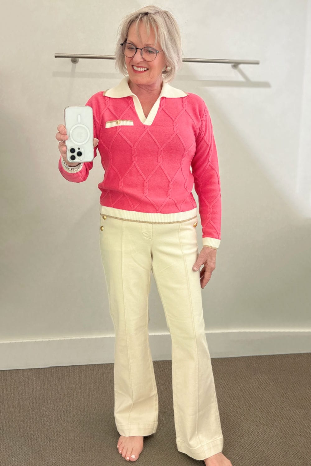 woman wearing talbots chanel inspired sweater in pink with ivory sailer flare pants