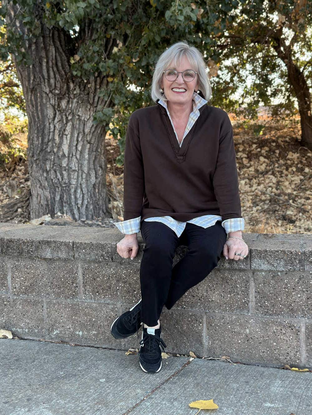 chocolate colored fleece top and black jeans from Frank and Eileen