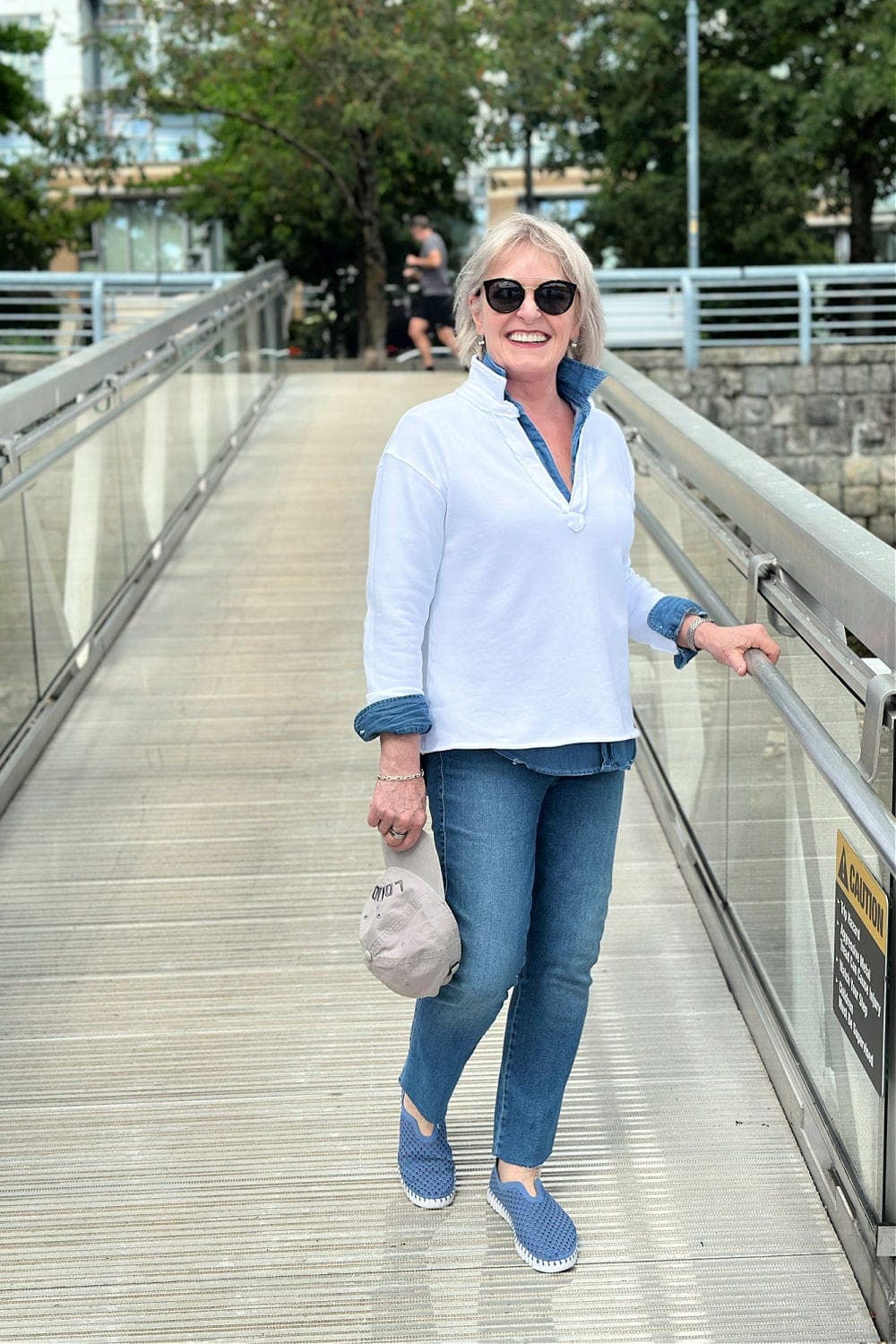 women at coast wearing frank and eileen johnny pullover and skinny jeans