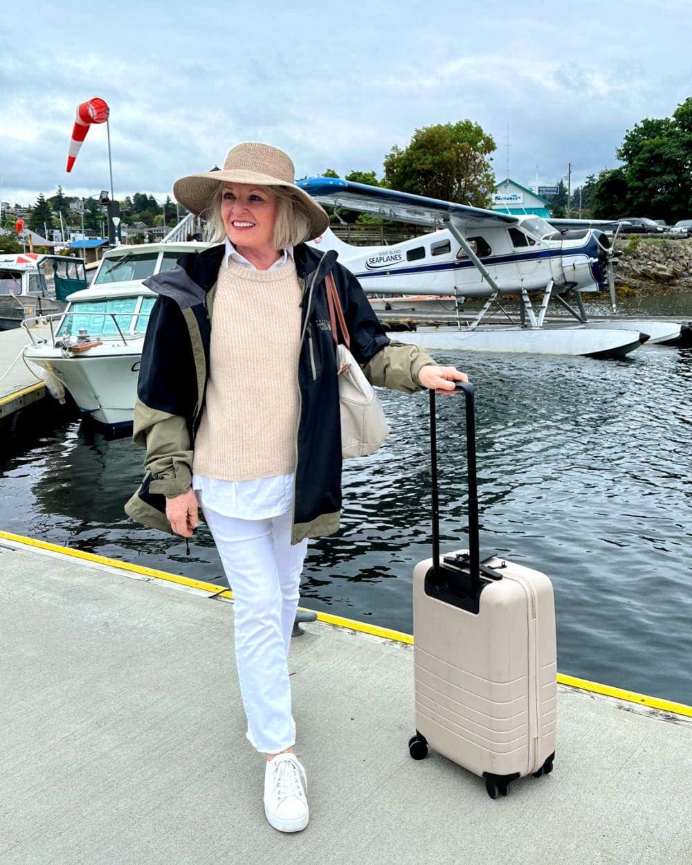 Woman Wearing a Layered Look with Jenni Kayne Fisherman Sweater