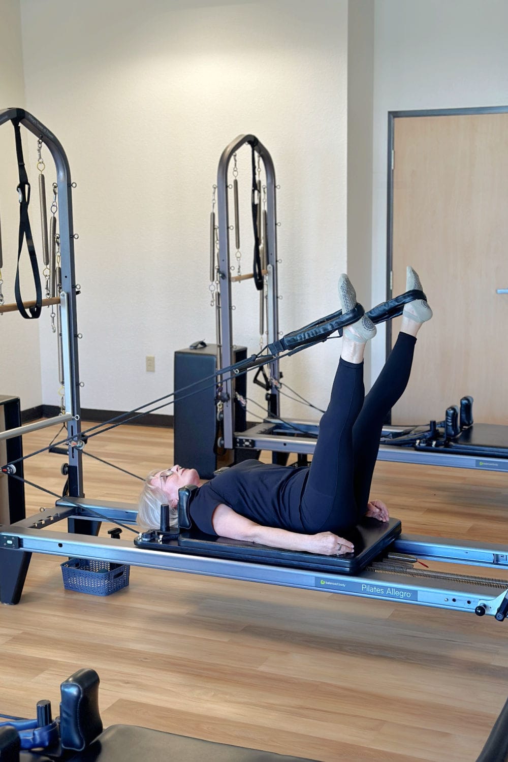 69 year olkd woman on pilates reformer to help her back