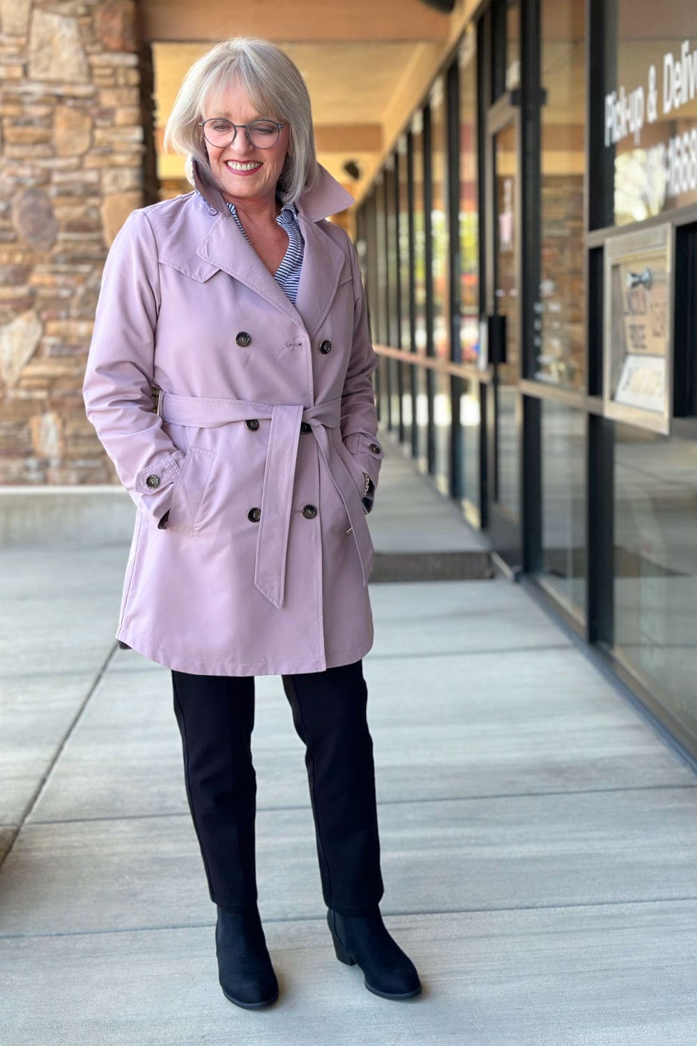 Lightweight cotton polo top styled under a jacket for an easy everyday spring look.