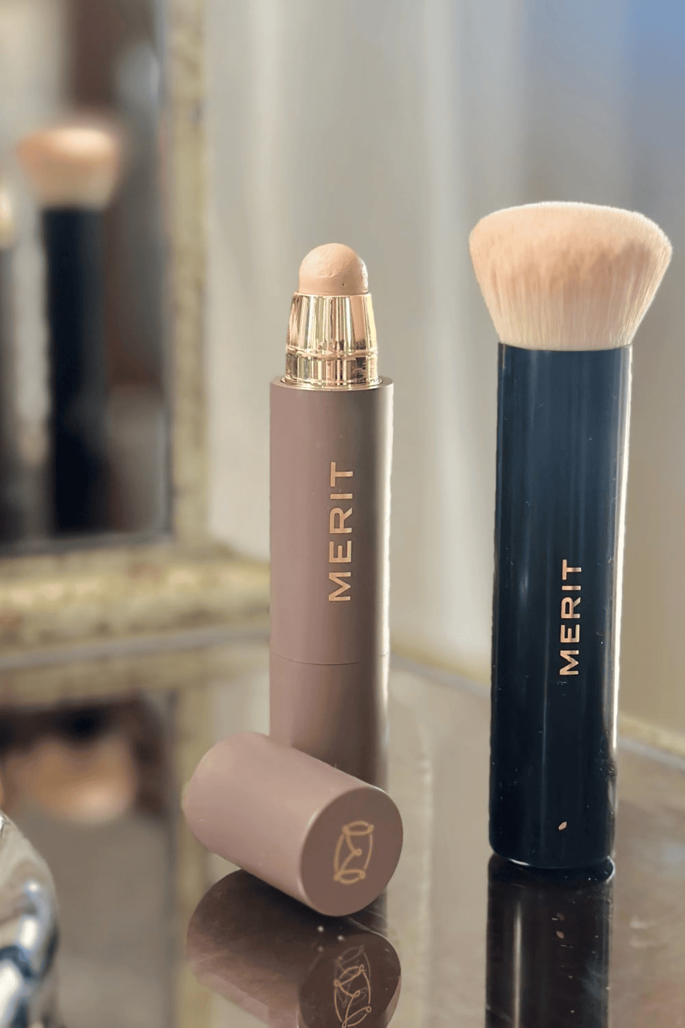 Merit Beauty Minimalist Complexion Stick open to show creamy texture, multitasking foundation and concealer for women over 60