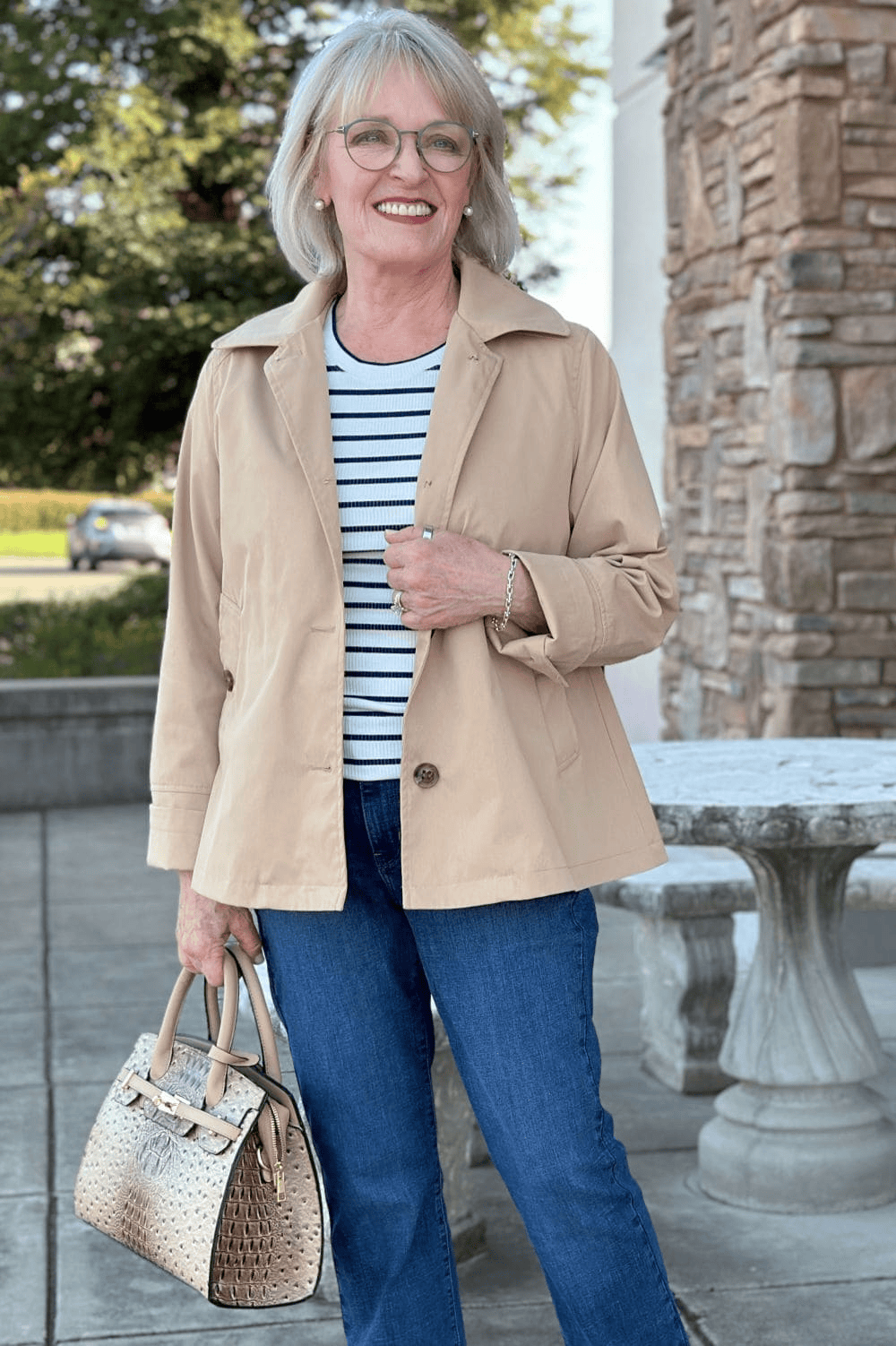 Elegant mid-length haircut with volume for mature hair