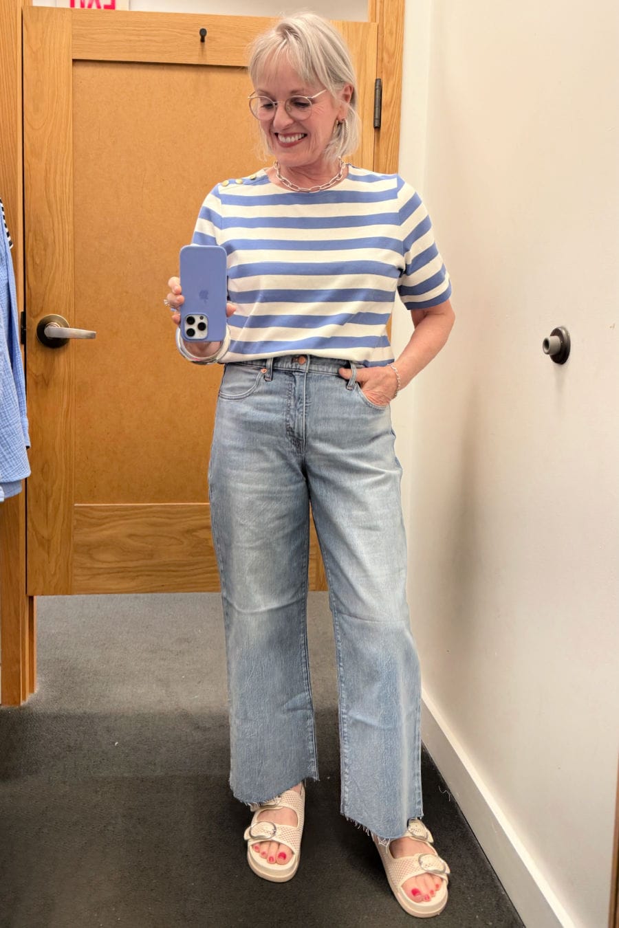 Periwinkle striped shoulder-button tee tucked into wide-leg crop jeans, worn by older woman in J.Crew Factory try-on