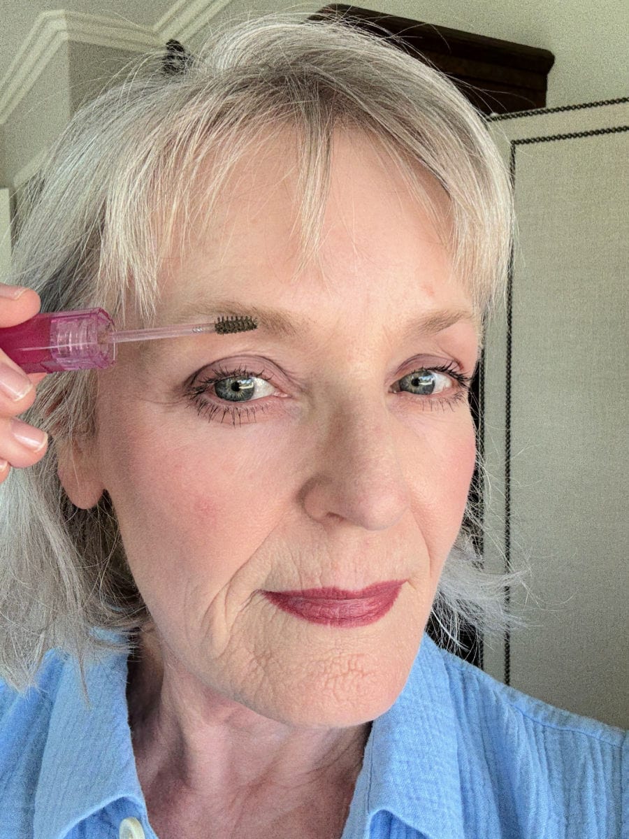 Natural eyebrow makeup result for woman over 60 with softly defined brows