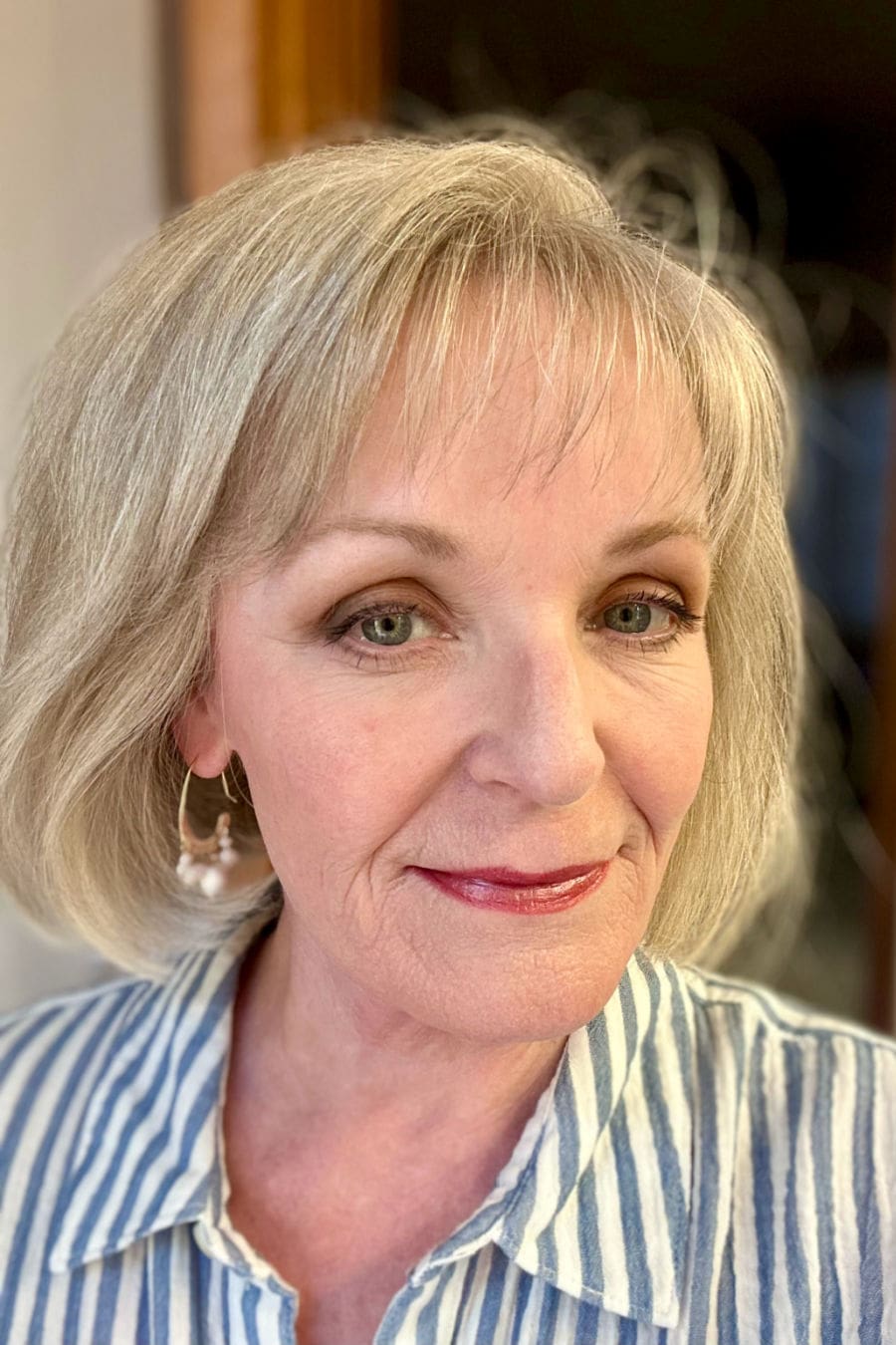 Medium-length hairstyle with face-framing layers for fine hair