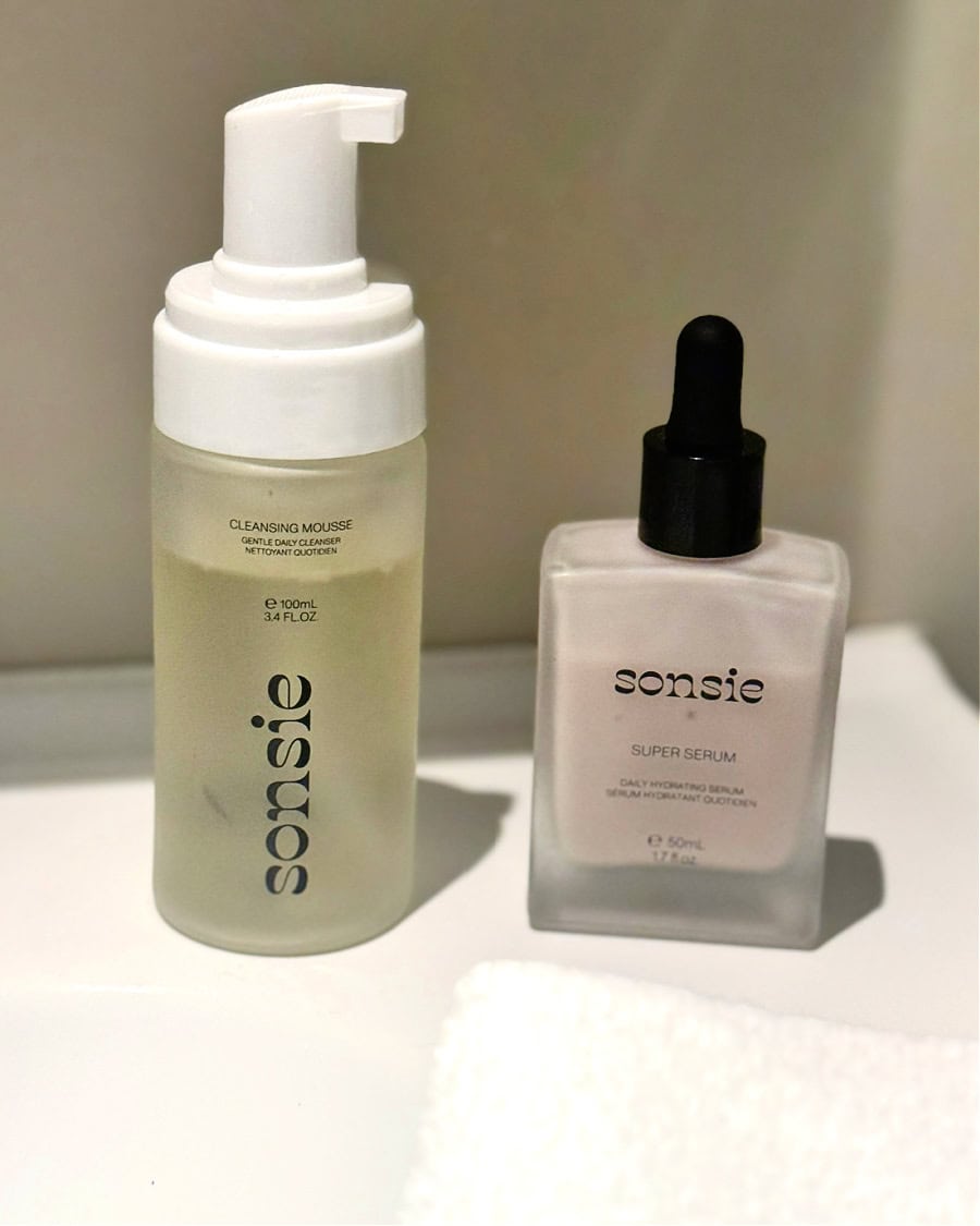 Sonsie Cleansing Mousse gentle face wash and Sonsie Super Serum with niacinamide on bathroom sink