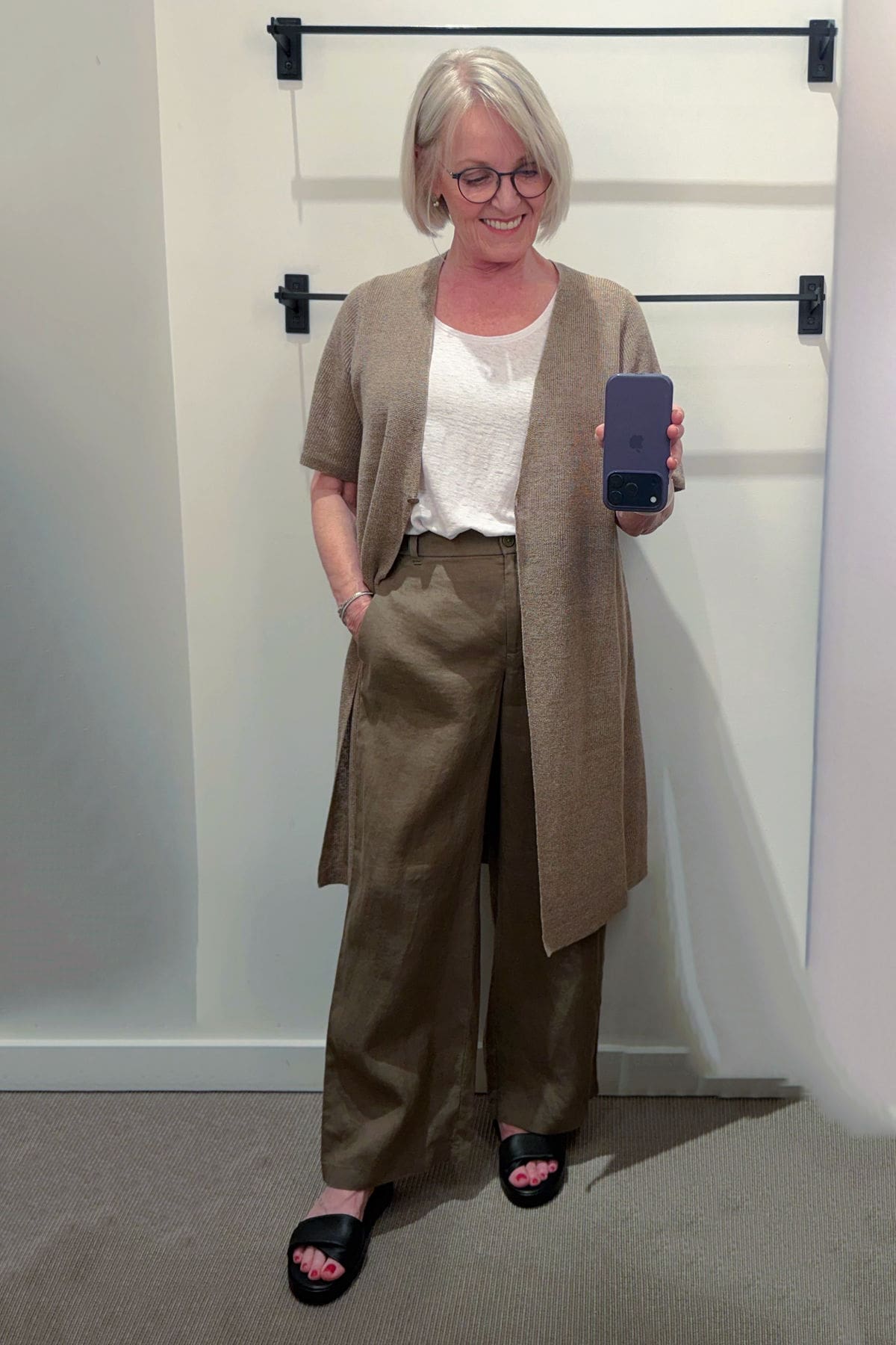 woman over 50 wearing walnut colored linen sweater and pants from eileen fisher summer 2026 collection